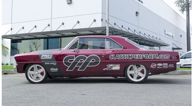  A burgundy 1967 Chevy Nova Restomod showcasing Classic Performance Products performance parts.