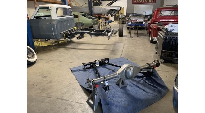 Installation of Strange Engineering's rear axle on a C10 truck.